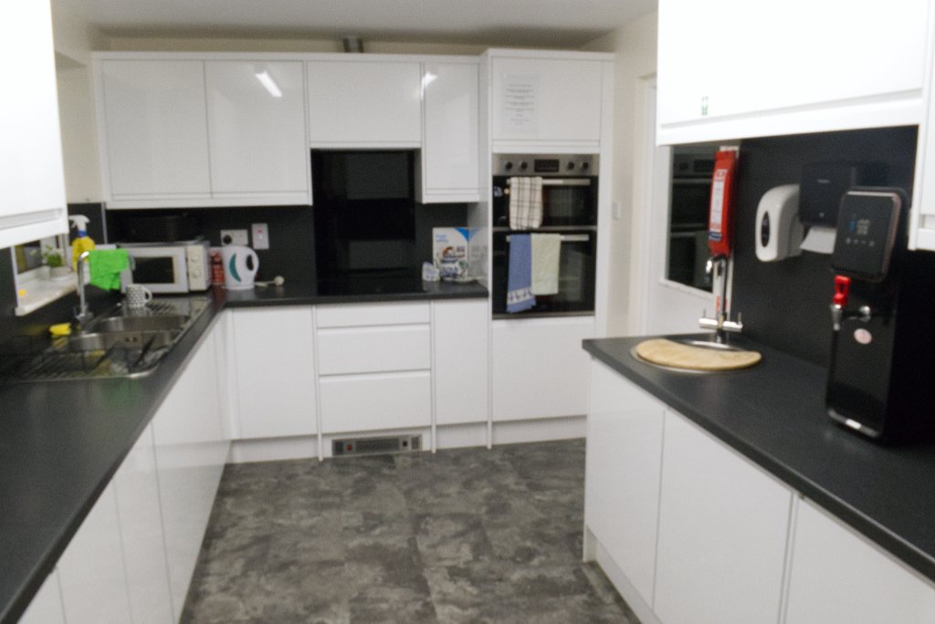 The hall kitchen, with worktops, cupboards and cooking facilities